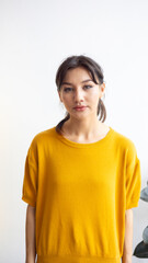 Image of young asian woman, smiling and standing over white background