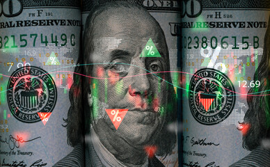 Benjamin Franklin face on USD dollar banknote with stock market chart and up down arrow for analysis investment on currency exchange or forex and economy inflation concept.