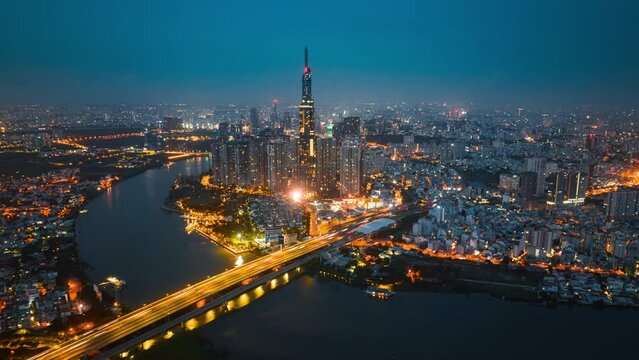 Aerial cityscape view of HoChiMinh city and the River Saigon, Vietnam with blue sky. Financial and business centers in developed Vietnam.