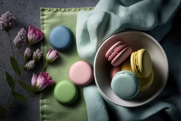 Keuken spatwand met foto Colorful macarons on a green napkin © Олег Фадеев