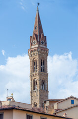 Fototapeta na wymiar Bell tower of the Abbey of Santa Maria in Florence, known as Badia Fiorentina