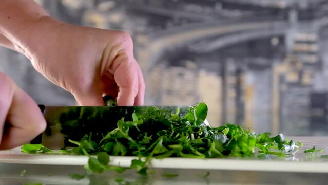 Cutting Fresh Pea Sprouts With a Knife For Decorating Dishes, Sprouts on a Wooden Cutting Board. Microgreens for Decorating Food. High quality FullHD footage