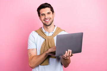 Photo of young man handsome expert technical support specialist hold netbook answer his clients...