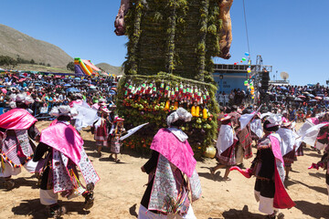 Pujillay festival in the town of Tarabuco, Bolivia. People are dancing around the pukara