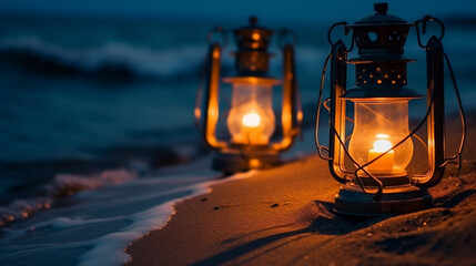 A photo of a traditional lantern placed on the beach sand at dusk. The faint lantern light illuminates the beach sand creating a gloomy and romantic atmosphere.