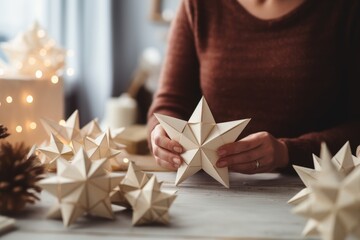 Woman making  handmade paper christmas tree decoration. DIY, hobby, zero waste, sustainable xmas idea