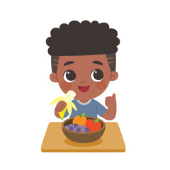 A Little Boy happy to eat fruits. Kid love vegetables and fruits. Healthy foods with benefits. Healthy food concept.