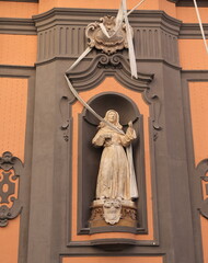 Sant'Angelo a Nilo Church Facade Detail with a Statue of Saint Candida in Naples, Italy