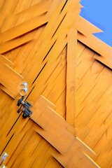 Double wooden driveway gates abstract with prism effect