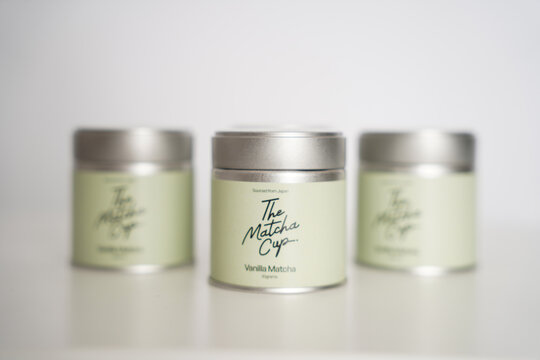 The matcha cup is a matcha packaging mockup isolated on a white background. Steel tin can packaging. 