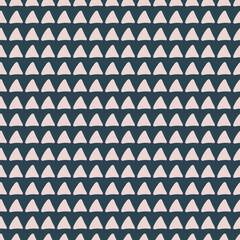 Navy blue and blush pink seamless vector geometric triangle pattern. Scandinavian-style funky rustic design is cool and edgy. Modern manly geometry design in a fun doodle style.