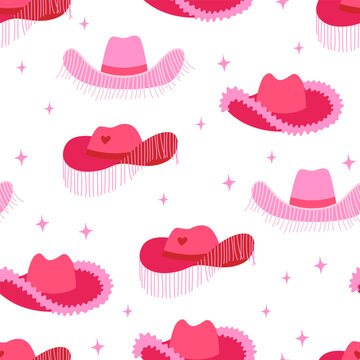Seamless pattern of various pink cowgirl hats with fringe, hearts and stars. Vector flat background. Retro disco cowboy party concept