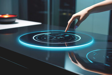 A hand touching a black induction stove cooktop in a modern kitchen, highlighting its hot and efficient household cooking capability. - obrazy, fototapety, plakaty