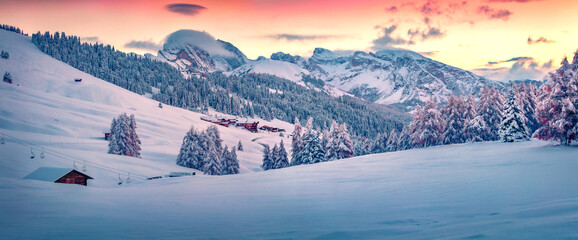 Panoramic morning view of snowy Alpe di Siusi village. Splendid winter scene of Dolomite Alps....