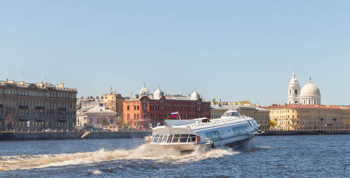 High-speed river passenger hydrofoil motor ship sails the Neva river