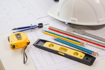 A home architect is reviewing a draft house plan. Projects assigned by customers and customized design before delivery Interior design and decoration ideas, African American, Indian