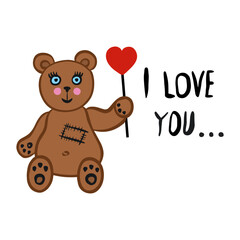 Toy teddy bear holding a heart and the inscription I LOVE YOU