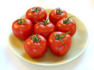 Group of whole tomatoes on plate