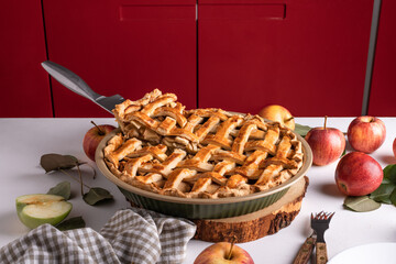 Homemade Apple Pie with fresh apples close up with tasty slice, top view, foody lifestyle
