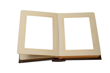 Open photo album in brown cover with gold border lines on pages, top view