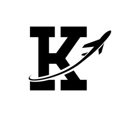 Black Antique Letter K Icon with an Airplane