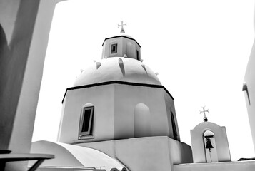 Fira, Greece - July 20, 2023: The architectural dome of the Saint Minas Holy Orthodox Church in...