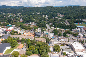 drone views of downtown Asheville city mountain