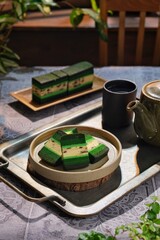 Malaysian dish Kek Lapis Sarawak or Sarawak layered cake with beautiful color over dark background....