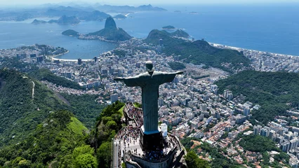 Poster Im Rahmen Christ The Redeemer At Tijuca Park In Rio De Janeiro Brazil. Mountains Corcovado Skyline. Tourism Scene. Christ The Redeemer At Rio De Janeiro Brazil. Christ Redeemer Mountains Skyline.  © ByDroneVideos