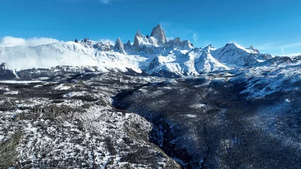 Papier Peint photo autocollant Fitz Roy Fitz Roy Valley At El Chalten In Patagonia Argentina. Snowy Landscape. Outdoor Aerial View. Patagonia Argentina. Frozen Snowcapped Mountain. Fitz Roy Valley At El Chalten In Patagonia Argentina.
