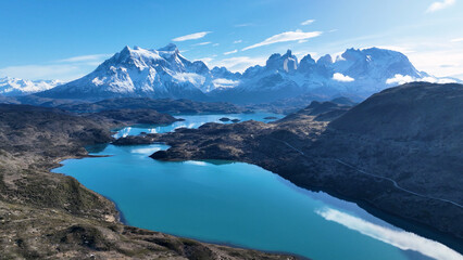 National Park Of Torres Del Paine In Punta Arenas Chile. Snowy Mountains. Glacial Scenery. Punta Arenas Chile. Winter Travel. National Park At Torres Del Paine In Punta Arenas Chile. - obrazy, fototapety, plakaty