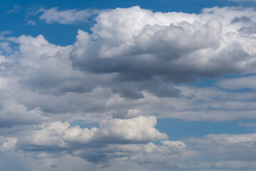 Fototapeta na wymiar Beautiful And Unusual Cloud Formations In A Blue Spring Sky In Wisconsin