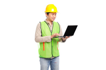 Young asian male construction worker and yellow safety helmet holding laptop on white background