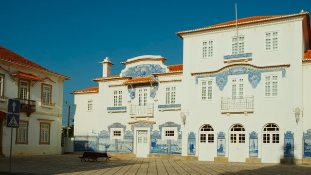 Blue tiles adorn the train station of Aveiro, Portugal, weaving stories of its maritime past through intricate mosaics and patterns