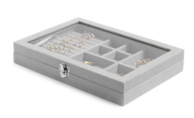 Jewelry box with many different golden accessories isolated on white