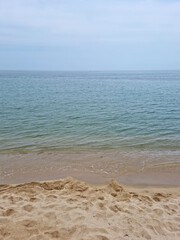 Soft beautiful ocean wave on sandy beach. Beach landscape.