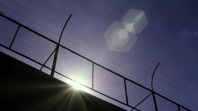 Prison Wall Against the Sun at a Maximum Security Prison in Argentina. 4K Resolution.