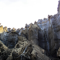 Permafrost wall in the Arctic, soil horizons defining time intervals, in the lower part thawed soil...