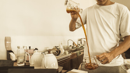 Barista preparing coffee drip. Man making coffee. Alternative ways of brewing coffee. Coffees shop concept, good quality beans