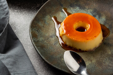 condensed milk pudding or 'pudim de leite condensado' in portuguese. traditional dessert also known...