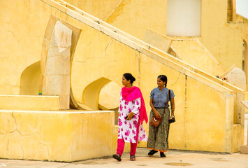 Woman tourist at the Jantar Mantar observatory, Jaipur, UNESCO World Heritage Site, India.