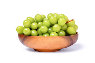 bowl of green grapes isolated on white