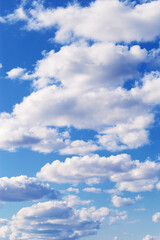 Blue sky with white clouds, bright colored cloudscape. Fluffy heaven pattern, aesthetic natural scene. Beautiful Cloudy background, nature environment backdrop, wallpaper, screensaver