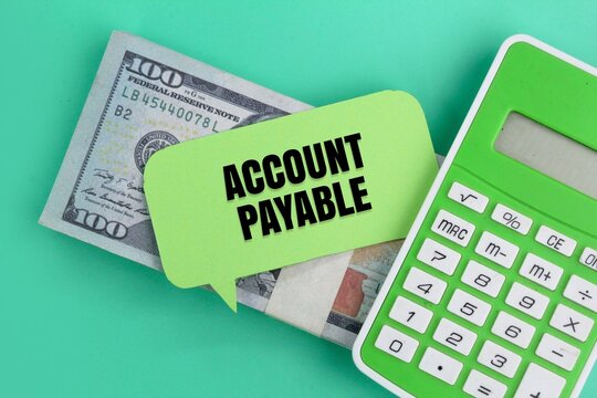 Calculator, Paper Money And Conversation Bubble With The Word ACCOUNT PAYABLE