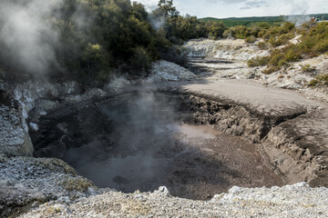 Steaming Crater at Wai-O-Tapu Geothermal Area, New Zealand.