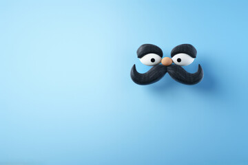 Cute penguin with mustache and eyes, standing against vibrant blue background. This image can be used for various purposes, such as advertisements, social media posts, or children's illustrations.