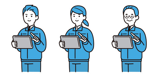 作業着を着てタブレットを操作する男性と女性