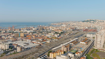Fototapeta na wymiar Naples, Italy. Panorama of the city overlooking the port and the railway station. Daytime, Aerial View