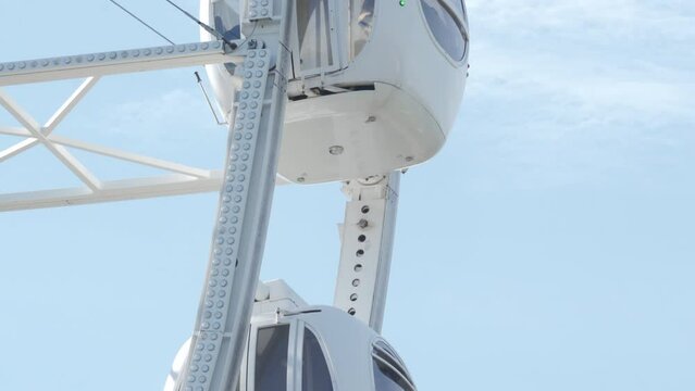 attraction Ferris wheel in amusement park Divo Ostrov, St. Petersburg, Russia