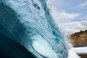 Fotobehang Canarische Eilanden Wave breaking on a beach in Canary Islands